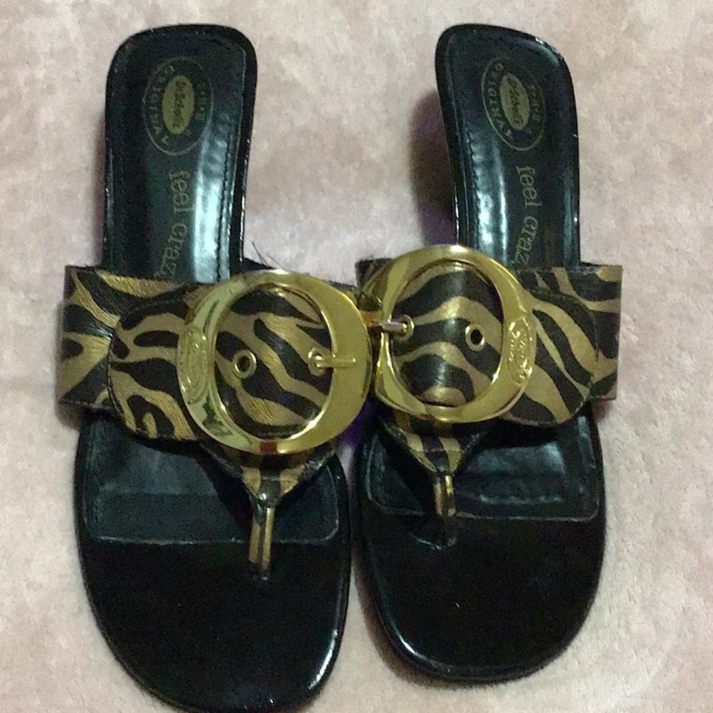 DR. SCHOLL’S Gold and Black Zebra print kitten heel sandals.